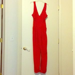 Guess Inc jumpsuit with lace size 2. Color Red Hot